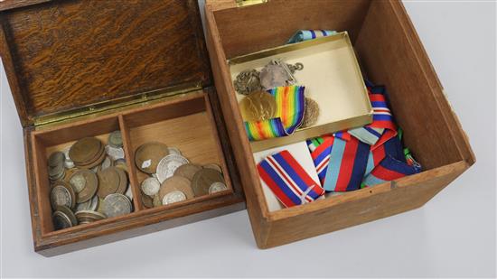 Military badges, goggles and coins